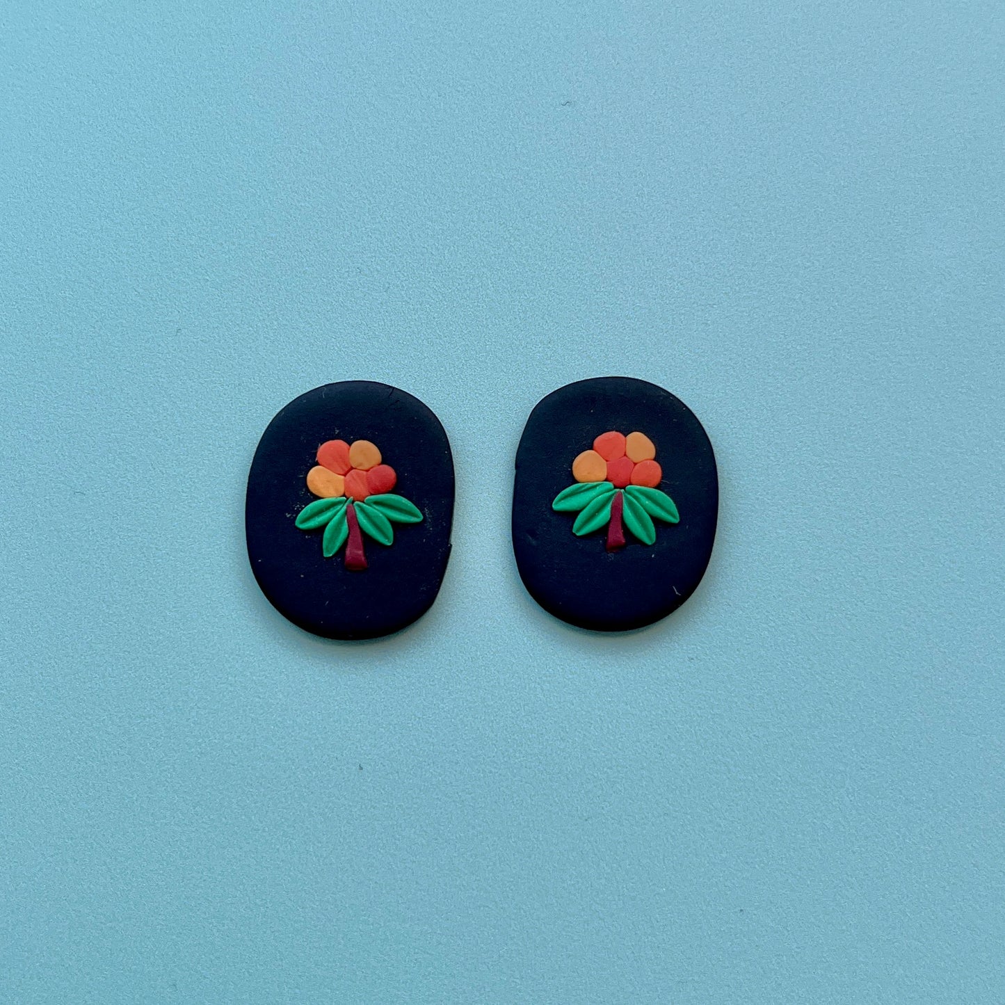 Aqpik on Black Polymer Clay Handmade Cabochon, Small